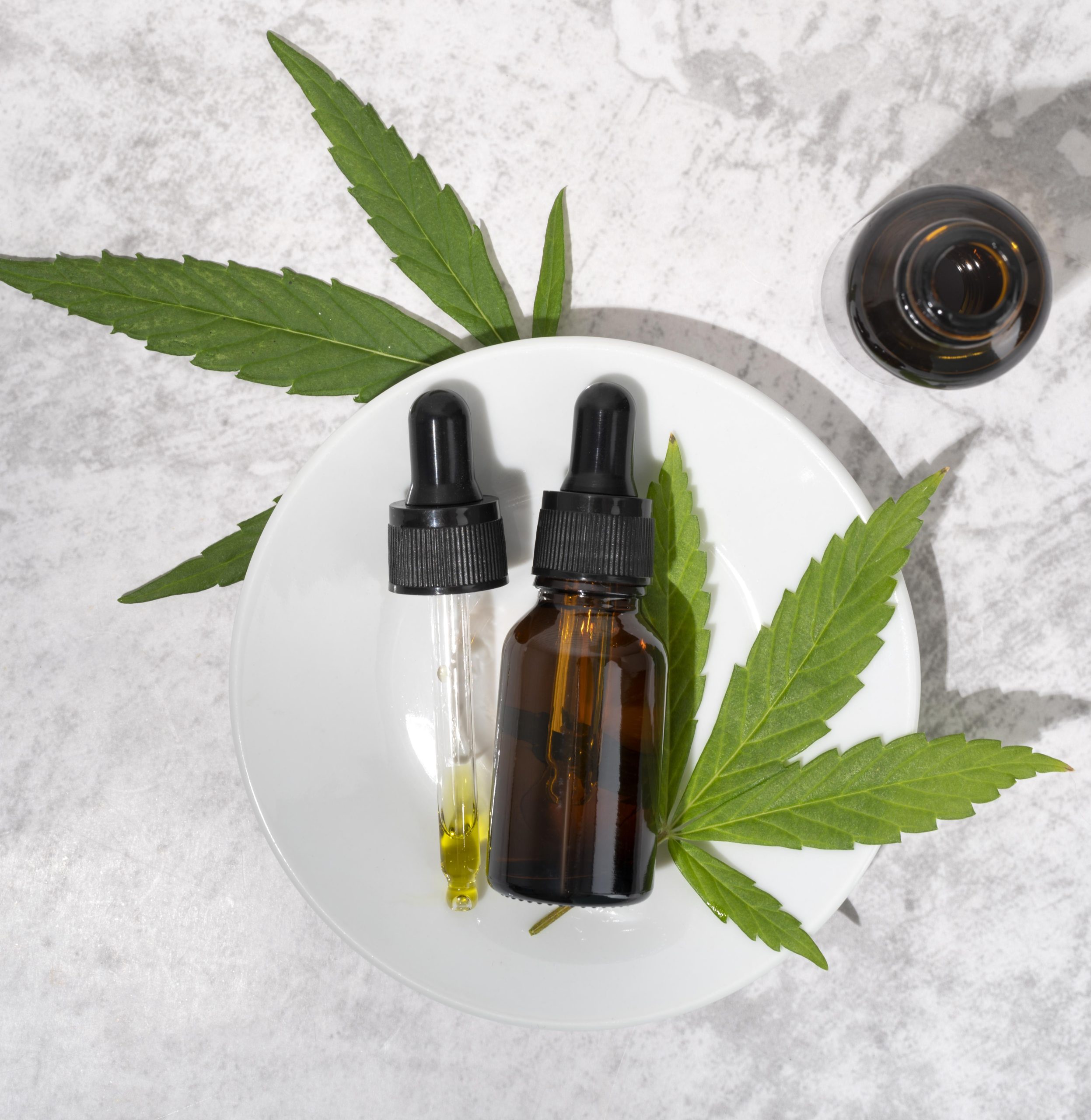 top-view-natural-cannabis-oil-bottle-assortment